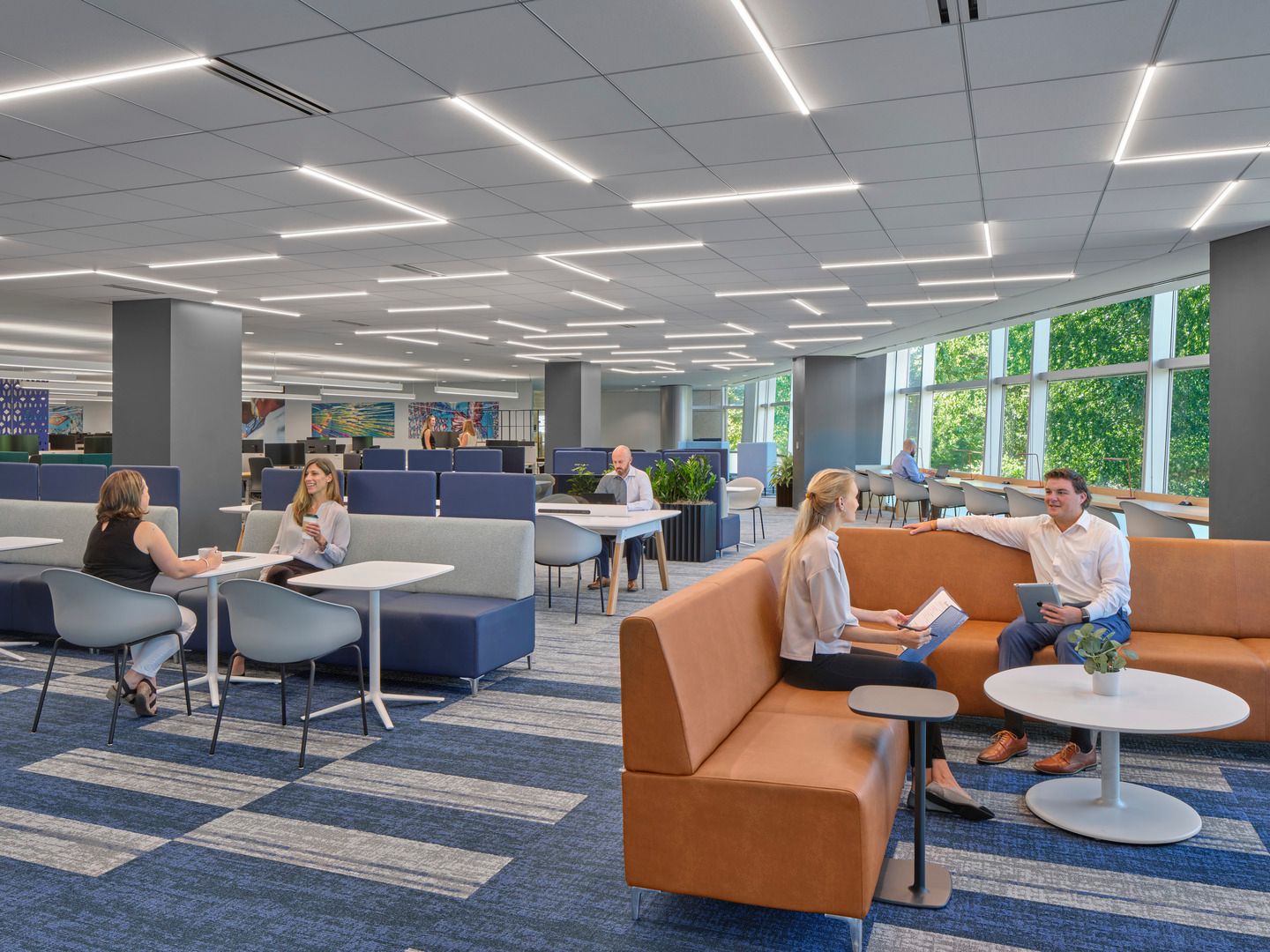 people sitting in a lounge area